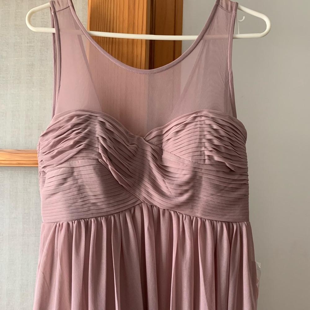 Long gown-color is mauve